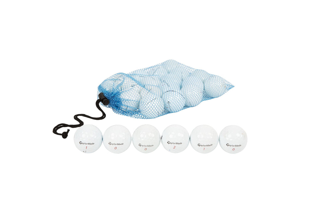 Serene golf course at sunrise with dew-covered grass, featuring an array of golf balls in various conditions and colorful personalized tees.