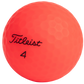 Red golf ball with 'Titleist' branding on a white background