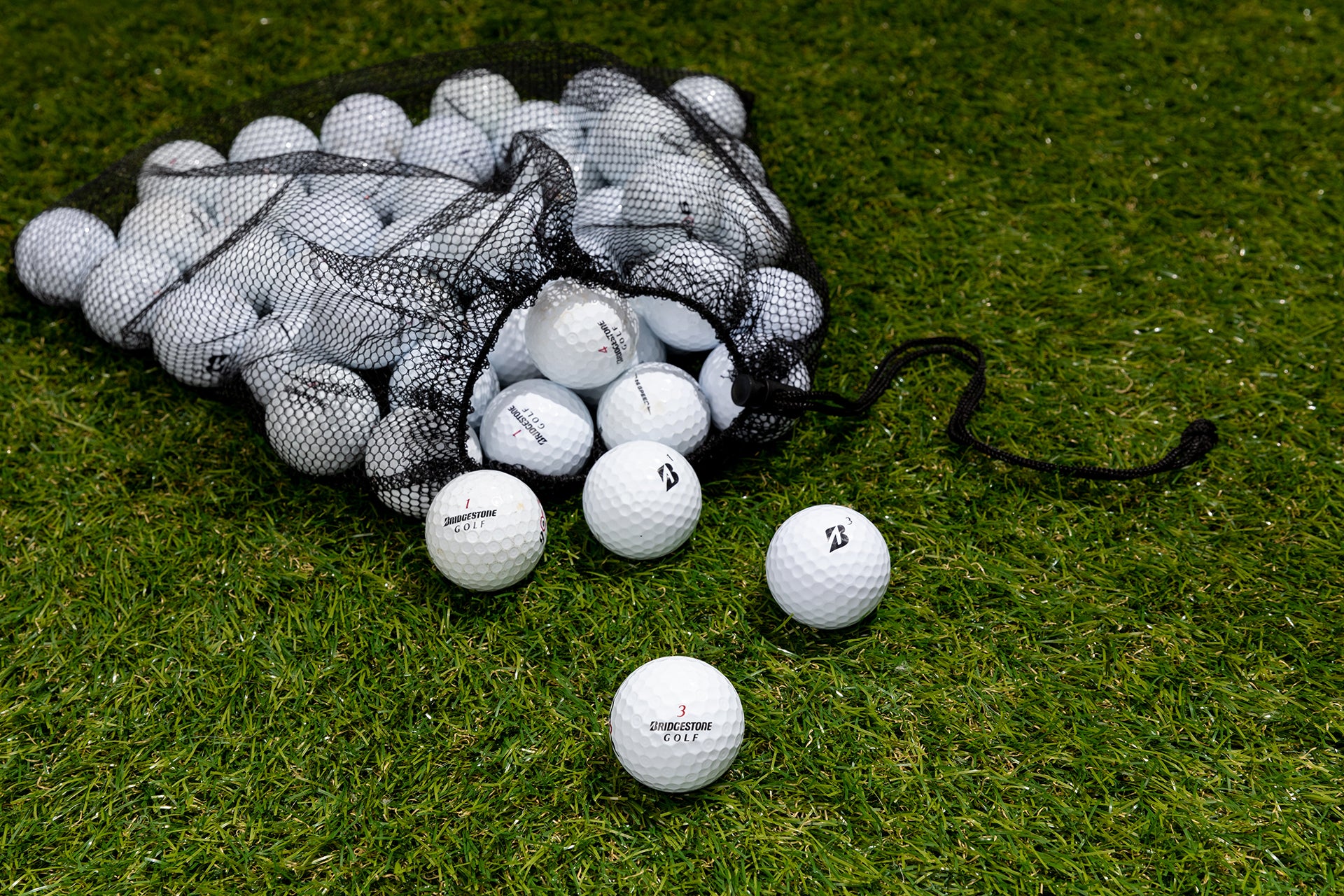 bridgestone e6 golf balls on green grass